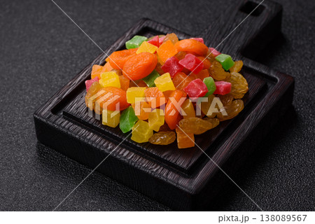 Dried apricots, raisins, and candied fruits as ingredients for baked goods and sweets. Dried fruits 138089567