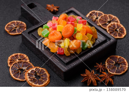 Dried apricots, raisins, and candied fruits as ingredients for baked goods and sweets. Dried fruits Dried apricots, raisins, and candied fruits as ingredients for baked goods and sweets. Dried fruits 138089570