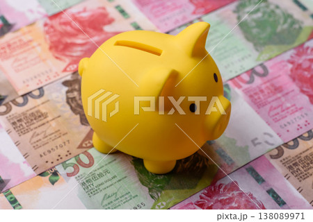 A piggy bank as a concept for storing, accumulating, and saving financial resources. A piggy bank A piggy bank as a concept for storing, accumulating, and saving financial resources. A piggy bank 138089971