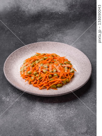 Asian salad with edamame beans, carrots, tofu, and spices. Edamame and carrot salad Asian salad with edamame beans, carrots, tofu, and spices. Edamame and carrot salad 138090043