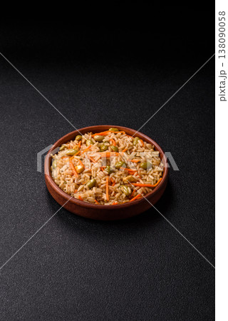 Asian food with rice, edamame, carrots, tofu, and spices. Rice with edamame and carrots Asian food with rice, edamame, carrots, tofu, and spices. Rice with edamame and carrots 138090058