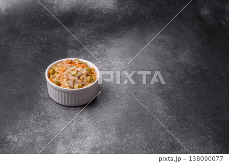 Asian food with rice, edamame, carrots, tofu, and spices. Rice with edamame and carrots 138090077