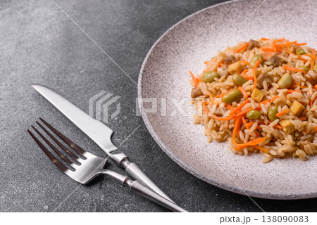 Asian food with rice, edamame, carrots, tofu, and spices. Rice with edamame and carrots Asian food with rice, edamame, carrots, tofu, and spices. Rice with edamame and carrots 138090083