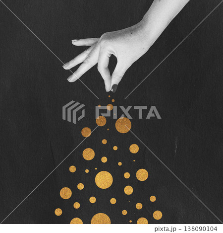 Hand sprinkling golden glitter circles creating magic Hand sprinkling golden glitter circles creating magic 138090104
