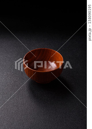 An empty round brown wooden bowl for Asian food. An empty wooden bowl An empty round brown wooden bowl for Asian food. An empty wooden bowl 138090195
