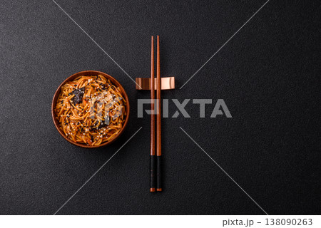 Yakisoba, Asian noodles with vegetables and meat, is a Japanese spicy food. Yakisoba or udon Yakisoba, Asian noodles with vegetables and meat, is a Japanese spicy food. Yakisoba or udon 138090263