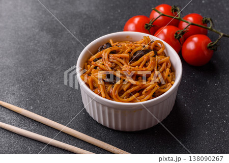 Yakisoba, Asian noodles with vegetables and meat, is a Japanese spicy food. Yakisoba or udon Yakisoba, Asian noodles with vegetables and meat, is a Japanese spicy food. Yakisoba or udon 138090267