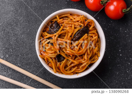 Yakisoba, Asian noodles with vegetables and meat, is a Japanese spicy food. Yakisoba or udon Yakisoba, Asian noodles with vegetables and meat, is a Japanese spicy food. Yakisoba or udon 138090268