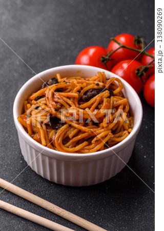 Yakisoba, Asian noodles with vegetables and meat, is a Japanese spicy food. Yakisoba or udon Yakisoba, Asian noodles with vegetables and meat, is a Japanese spicy food. Yakisoba or udon 138090269