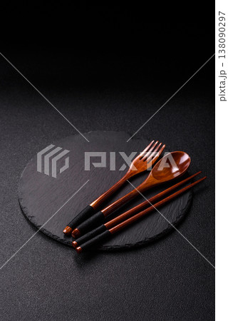 An empty round brown wooden bowl for Asian food. An empty wooden bowl An empty round brown wooden bowl for Asian food. An empty wooden bowl 138090297