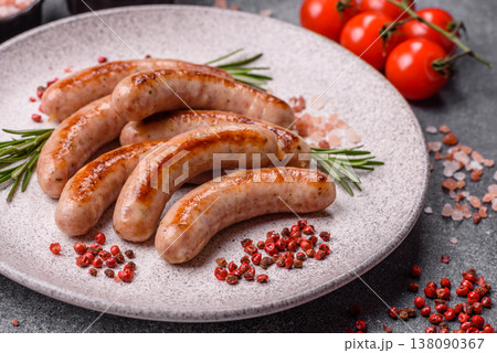 Grilled pork or chicken sausages, smoked fried food with salt and spices. Grilled sausages 138090367