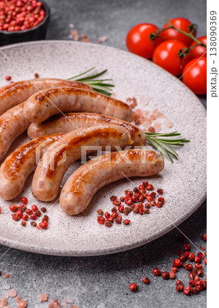 Grilled pork or chicken sausages, smoked fried food with salt and spices. Grilled sausages Grilled pork or chicken sausages, smoked fried food with salt and spices. Grilled sausages 138090369