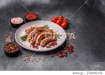 Grilled pork or chicken sausages, smoked fried food with salt and spices. Grilled sausages 138090370