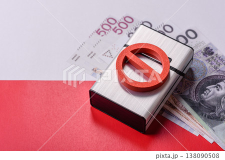 A metal cigarette box with a no smoking sign depicts a harmful habit. A cigarette box A metal cigarette box with a no smoking sign depicts a harmful habit. A cigarette box 138090508