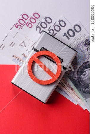 A metal cigarette box with a no smoking sign depicts a harmful habit. A cigarette box 138090509