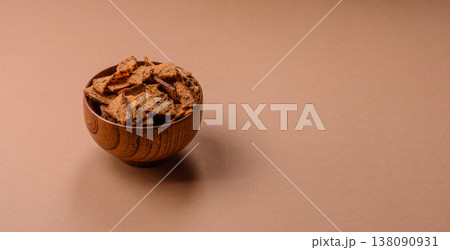 Croutons or crackers made from rye bread with garlic, salt, and spices. Croutons with salt 138090931