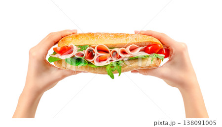 Ham sandwich in hands isolated on white background, deli lunch with tomato and arugula Ham sandwich in hands isolated on white background, deli lunch with tomato and arugula 138091005