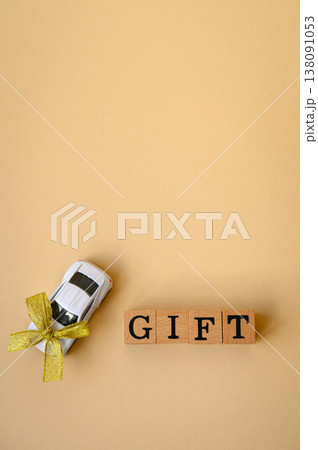 Conceptual background, toy car with a bow as a gift with copy space. The car as a gift 138091053