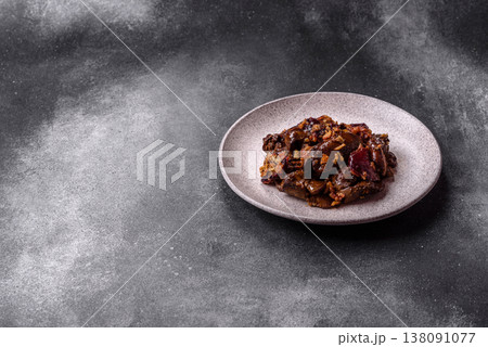Chicken, duck, or goose liver with plums, onions, and spices. Chicken liver 138091077