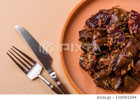 Chicken, duck, or goose liver with plums, onions, and spices. Chicken liver 138091094