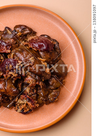 Chicken, duck, or goose liver with plums, onions, and spices. Chicken liver 138091097