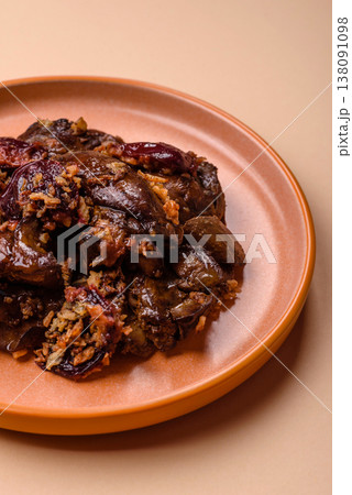 Chicken, duck, or goose liver with plums, onions, and spices. Chicken liver Chicken, duck, or goose liver with plums, onions, and spices. Chicken liver 138091098