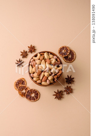 A mix of cashews, pistachios, almonds, brazil nuts and hazelnuts. Nuts as a food background A mix of cashews, pistachios, almonds, brazil nuts and hazelnuts. Nuts as a food background 138091490