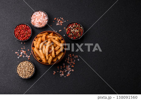 Croutons or crackers made from rye bread with garlic, salt, and spices. Croutons with salt Croutons or crackers made from rye bread with garlic, salt, and spices. Croutons with salt 138091560