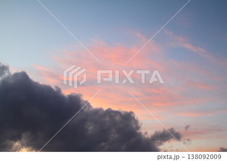 Blurry background of red sunset sky. Dramatic sky with colorful cloud background. Red burning sunset sky. Copy space. 138092009