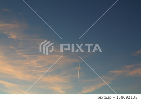 airplane flying in the sky. blue sky background with tiny clouds. airplane flying in the sky. blue sky background with tiny clouds. 138092135