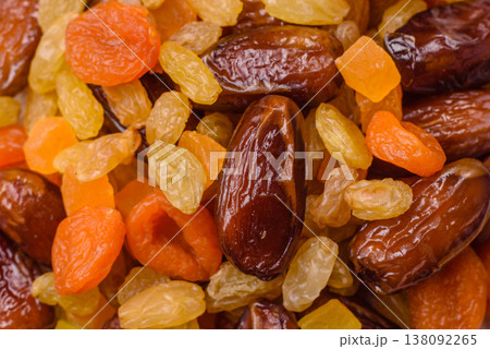 Dried apricots, raisins, and candied fruits as ingredients for baked goods and sweets. Dried fruits 138092265