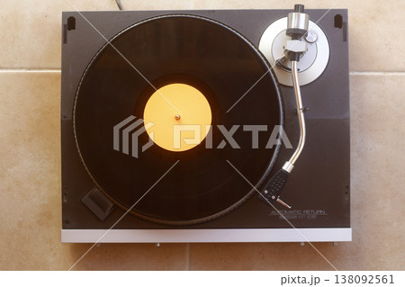 old vinyl record with clipping path. DJ Turntable with Vinyl Record, Playing, Top View 138092561