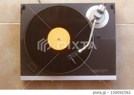 old vinyl record with clipping path. DJ Turntable with Vinyl Record, Playing, Top View 138092562