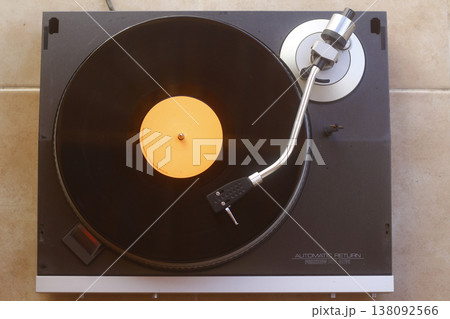 old vinyl record with clipping path. DJ Turntable with Vinyl Record, Playing, Top View 138092566