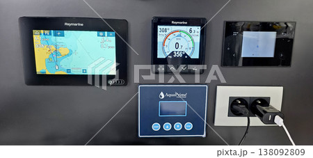 Raymarine navigation display panels with AquaPrime control unit on wall Raymarine navigation display panels with AquaPrime control unit on wall 138092809
