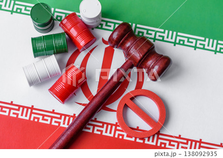 Barrels of oil, gas, or chemicals bearing the Iranian flag and a ban sign. Barrels of Iranian oil Barrels of oil, gas, or chemicals bearing the Iranian flag and a ban sign. Barrels of Iranian oil 138092935