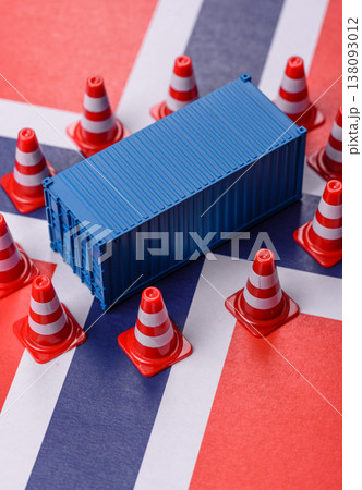 The cargo container ban on the Norwegian flag as a conceptual backdrop. The cargo container embargo The cargo container ban on the Norwegian flag as a conceptual backdrop. The cargo container embargo 138093012