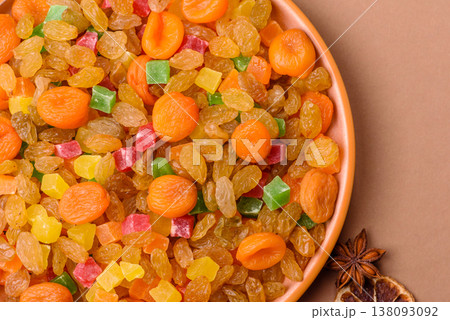 Dried apricots, raisins, and candied fruits as ingredients for baked goods and sweets. Dried fruits 138093092