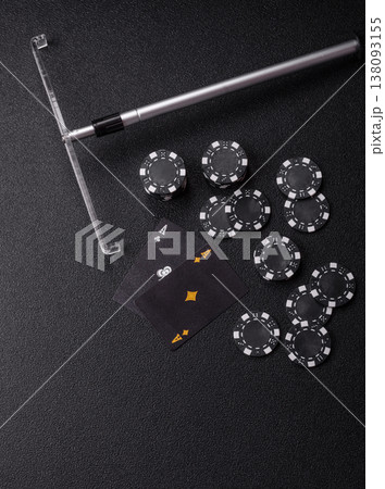 Playing cards and chips on a table, a gambling game of blackjack or baccarat. Cards and chips Playing cards and chips on a table, a gambling game of blackjack or baccarat. Cards and chips 138093155