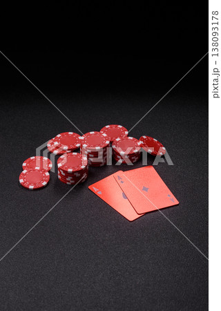 Playing cards and chips on a table, a gambling game of blackjack or baccarat. Cards and chips 138093178
