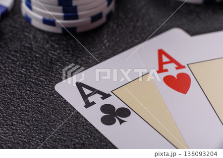 Playing cards and chips on a table, a gambling game of blackjack or baccarat. Cards and chips Playing cards and chips on a table, a gambling game of blackjack or baccarat. Cards and chips 138093204