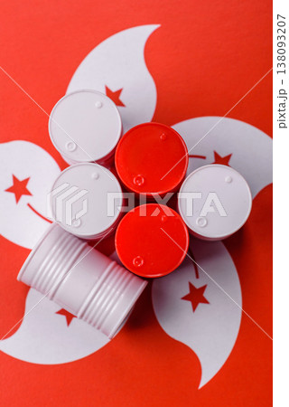 Metal barrels of oil, gas, or chemicals on the hong kong flag. Barrels of oil Metal barrels of oil, gas, or chemicals on the hong kong flag. Barrels of oil 138093207