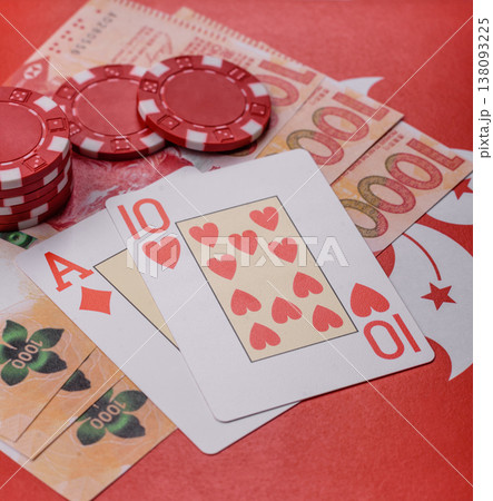 Playing cards and chips on a table, a gambling game of blackjack or baccarat. Cards and chips Playing cards and chips on a table, a gambling game of blackjack or baccarat. Cards and chips 138093225