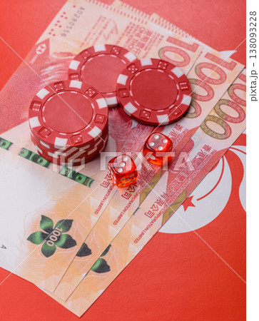 Dices and chips on a table, a gambling game of poker. Dices and chips Dices and chips on a table, a gambling game of poker. Dices and chips 138093228