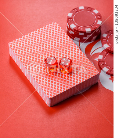 Dices and chips on a table, a gambling game of poker. Dices and chips Dices and chips on a table, a gambling game of poker. Dices and chips 138093234