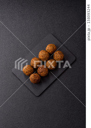 Falafel, a hearty Arabic dish made from boiled chickpeas for vegetarians. Chickpea falafel 138093244