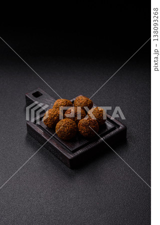 Falafel, a hearty Arabic dish made from boiled chickpeas for vegetarians. Chickpea falafel Falafel, a hearty Arabic dish made from boiled chickpeas for vegetarians. Chickpea falafel 138093268