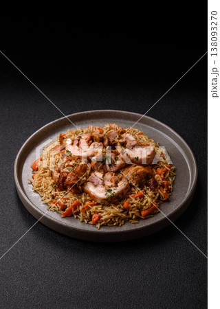Kabsa or mandi, an Arabic dish with rice and chicken, salt, and spices. Kabsa or mandi Kabsa or mandi, an Arabic dish with rice and chicken, salt, and spices. Kabsa or mandi 138093270