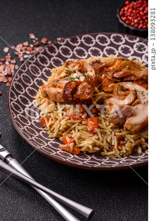 Kabsa or mandi, an Arabic dish with rice and chicken, salt, and spices. Kabsa or mandi Kabsa or mandi, an Arabic dish with rice and chicken, salt, and spices. Kabsa or mandi 138093281