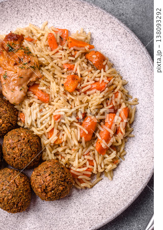 Kabsa or mandi, an Arabic dish with rice and chicken, salt, and spices. Kabsa or mandi Kabsa or mandi, an Arabic dish with rice and chicken, salt, and spices. Kabsa or mandi 138093292